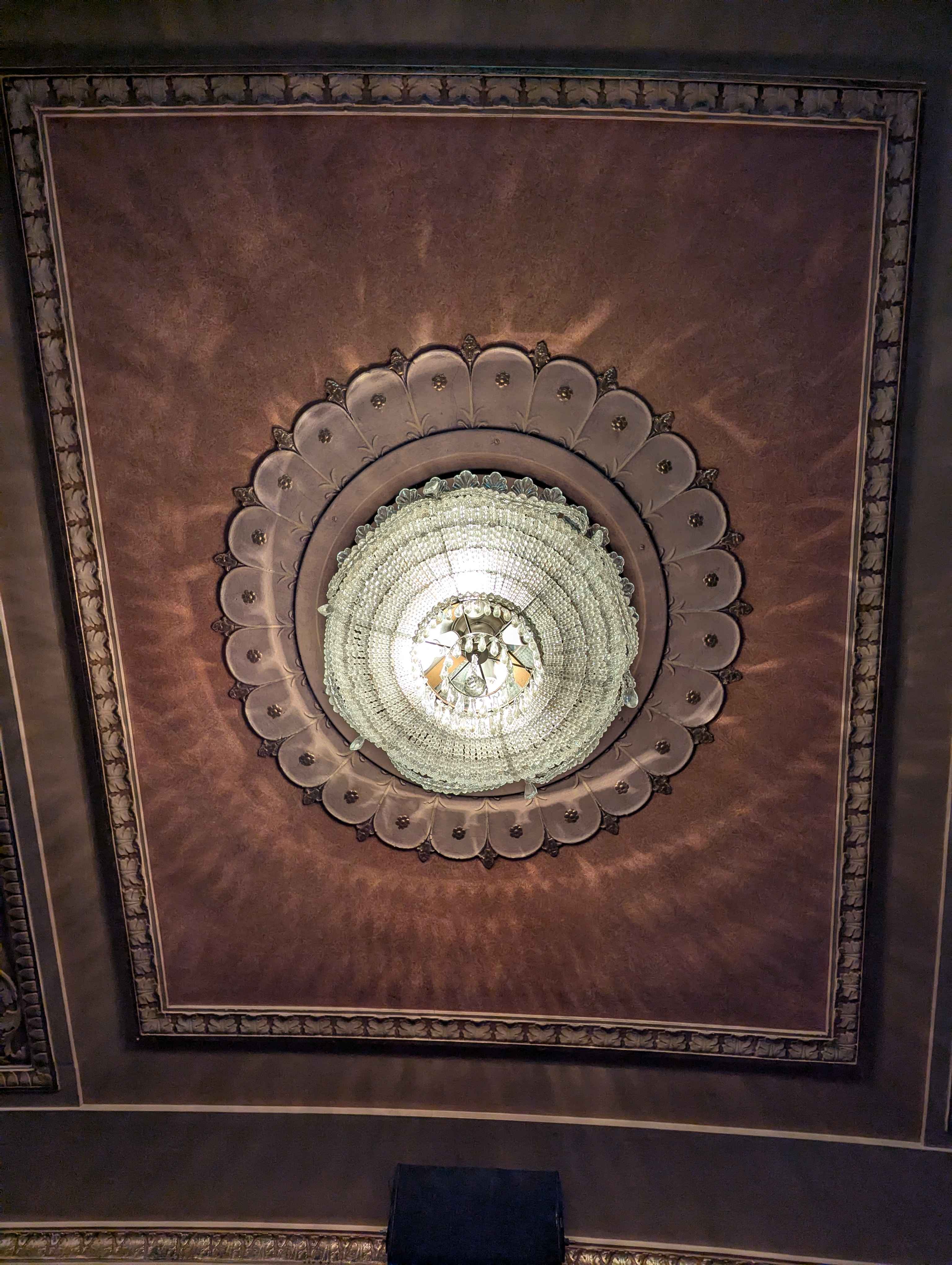 A picture of the ceiling of the theater. I wish I had taken more pictures inside it was a beautiful building.