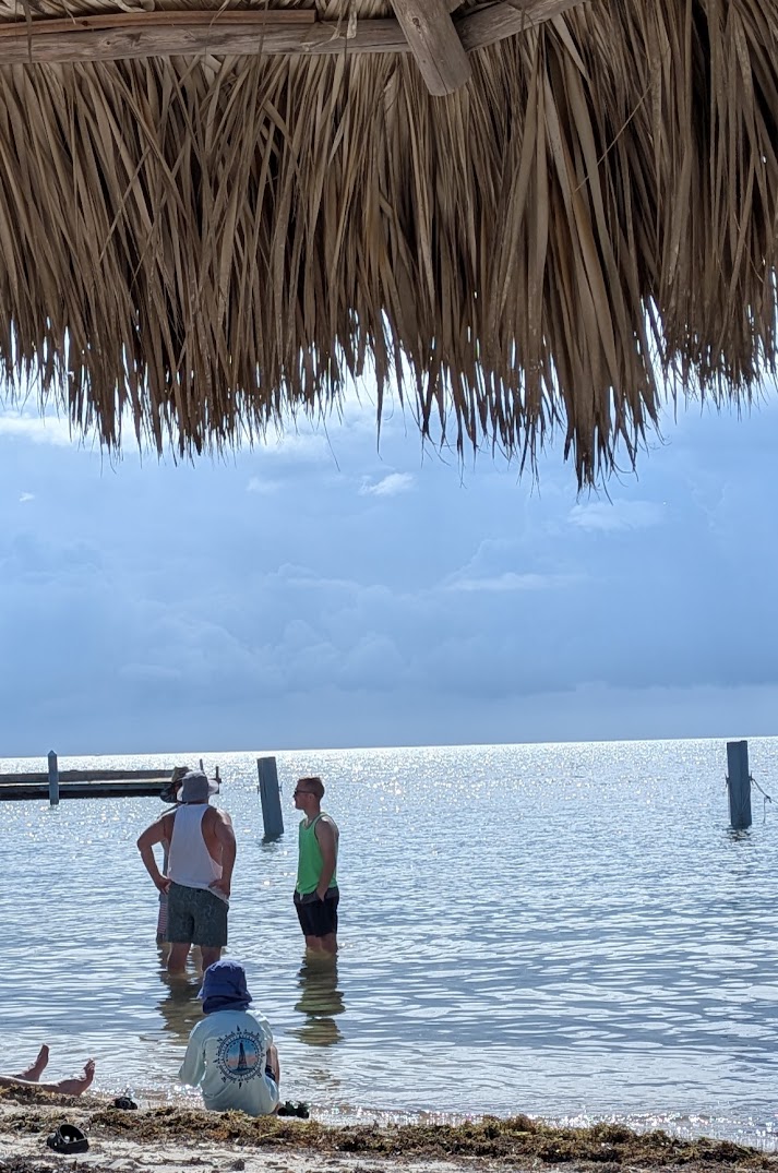 A picture of Jon, Josh, Jacob and Avery hanging out in the water
