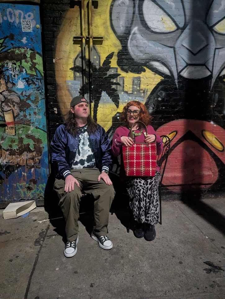 Jacob and I in our costumes. We're from the movie Weapons, but I also just look like his crazy aunt!