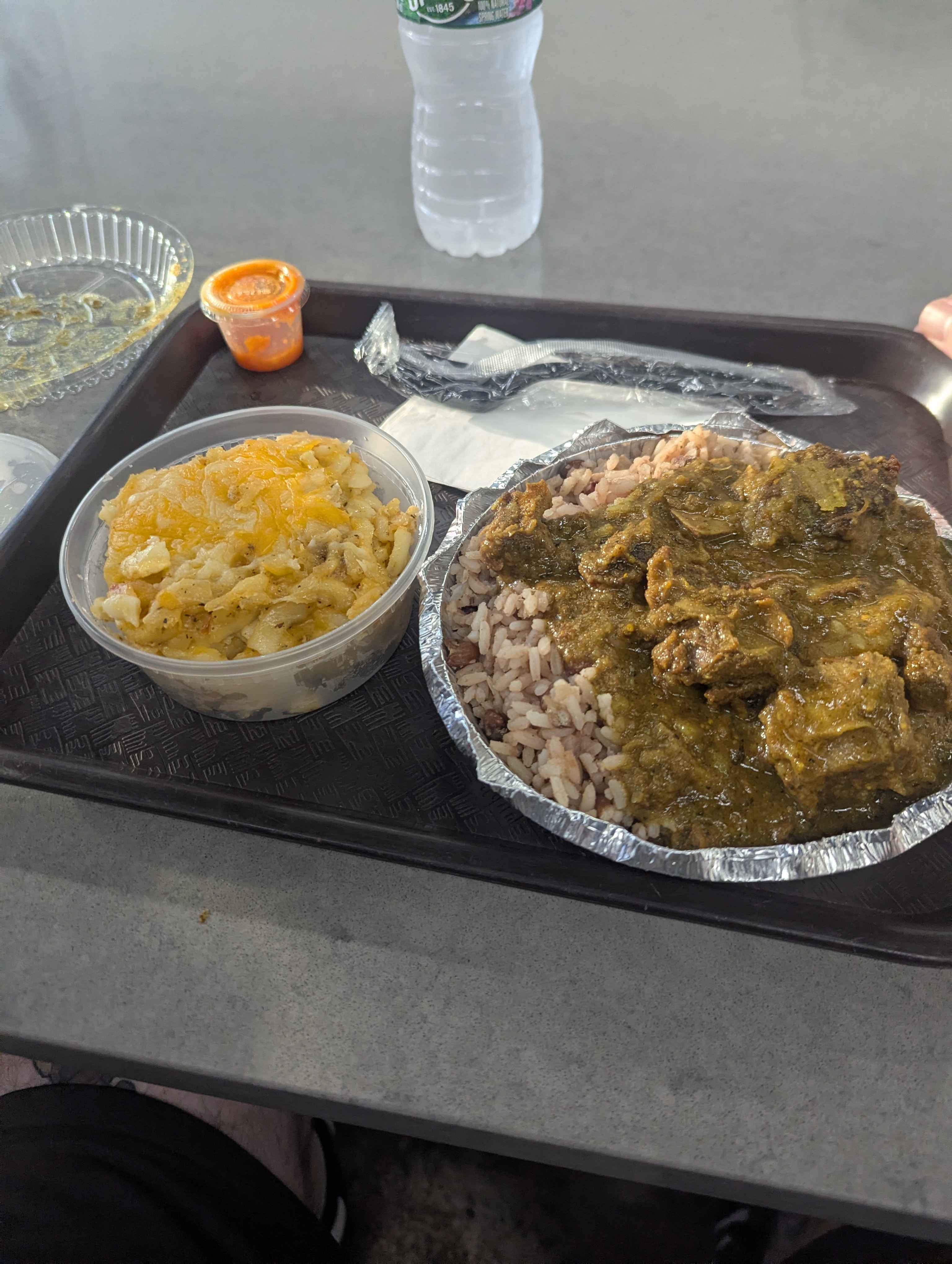 Jacob's dinner. Rice, curried goat and mac & cheese.