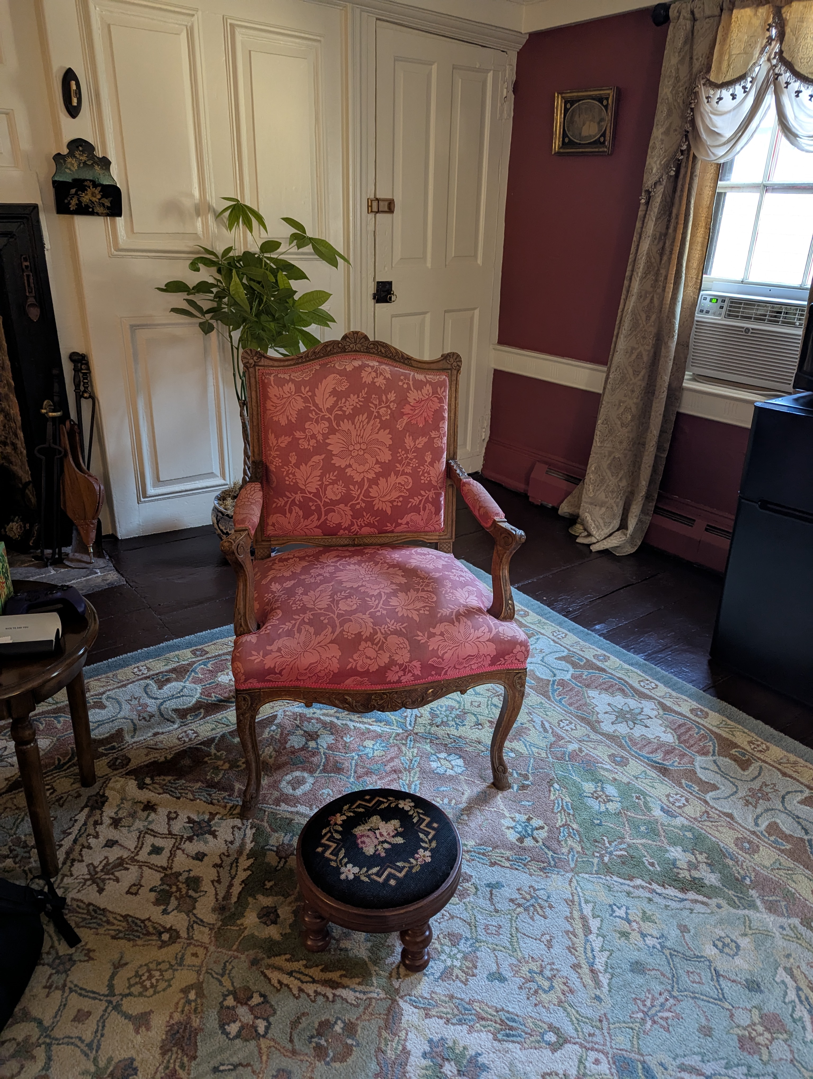 A chair in our hotel room. The decorations matched how old the inn was.