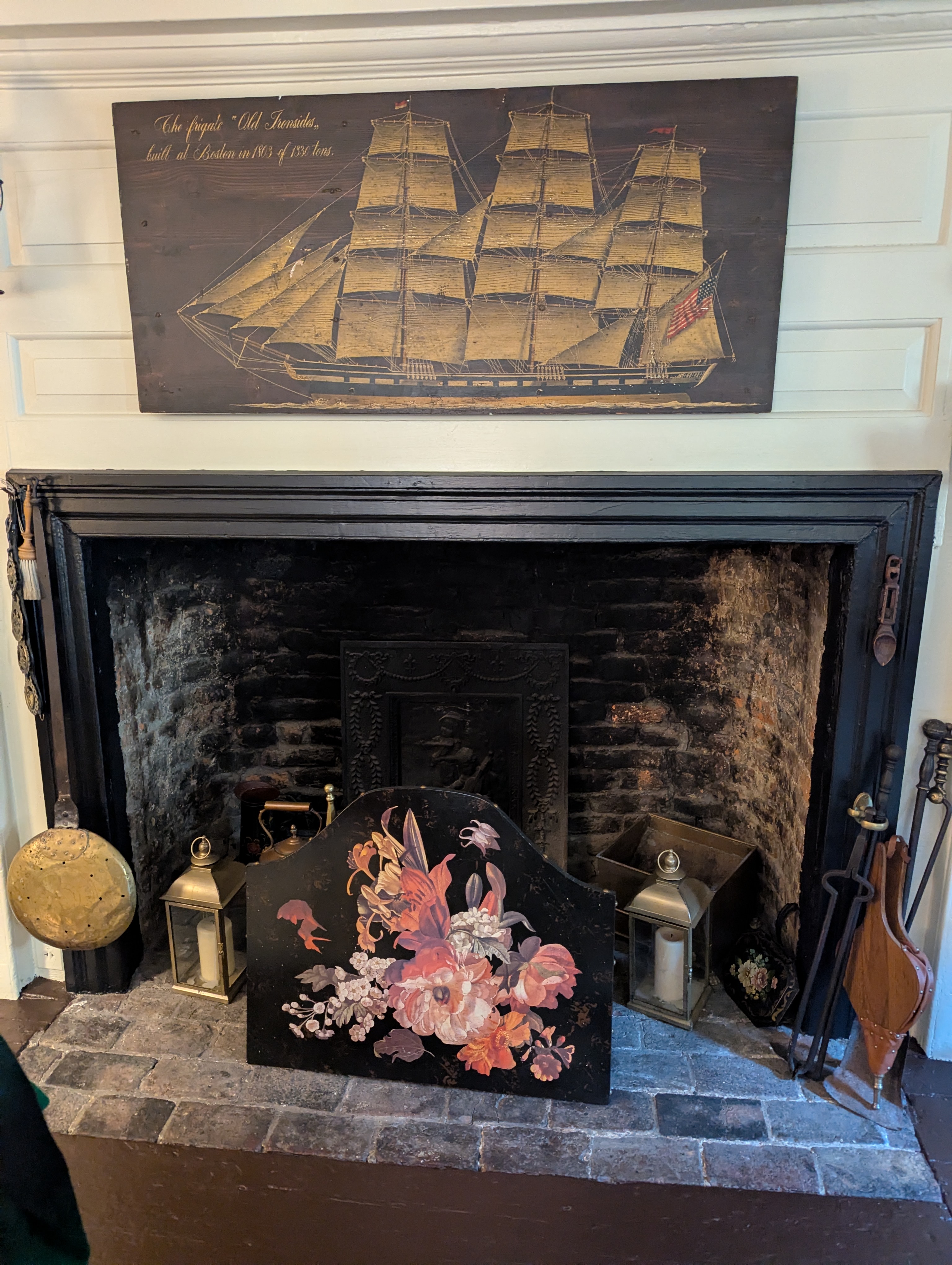 A fireplace as part of the hotel room. None of the fireplaces worked anymore, but many were original to the inn.