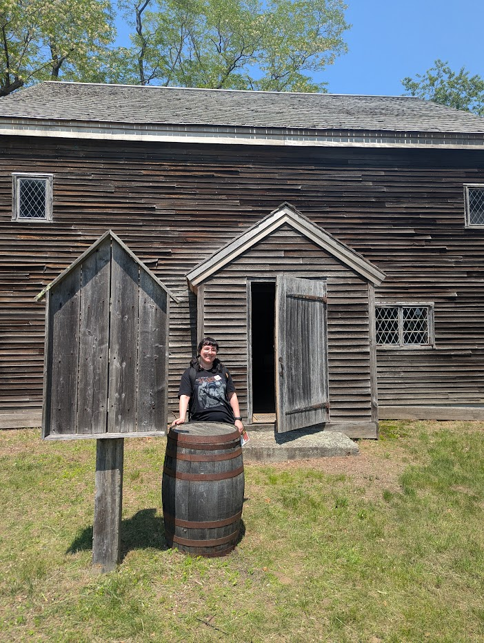 Jen outside the meeting house.